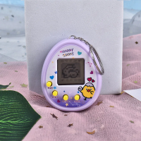 صورة ألعاب ألعاب إلكترونية للحيوانات الأليفة من Tamagotchi ، ألعاب حيوانات رقمية إلكترونية افتراضية للأطفال ، طفل